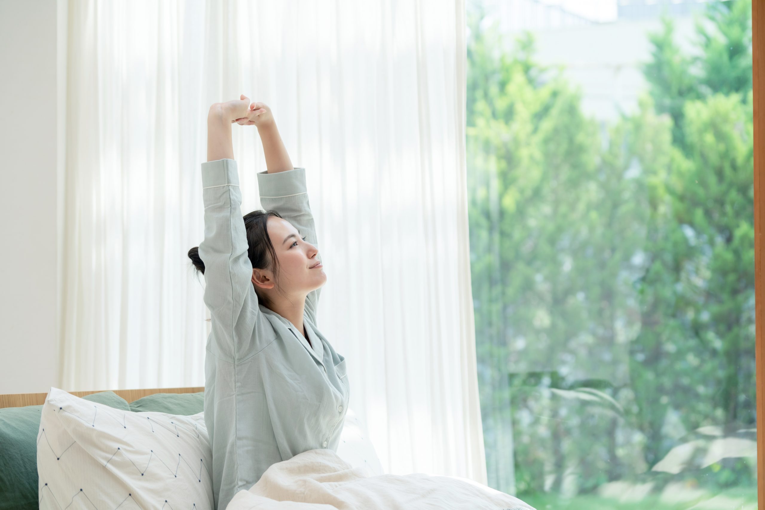 爽やかな朝　快眠した女性